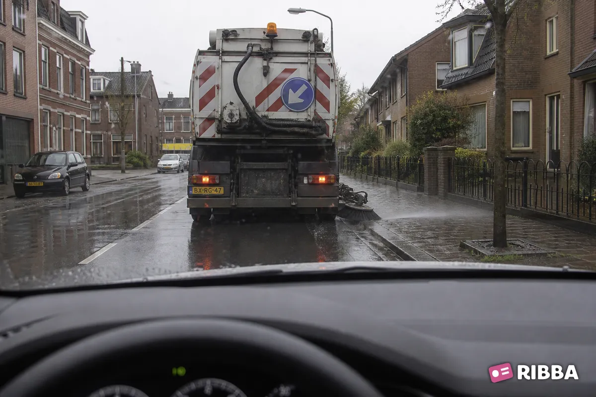 veegwagen in het verkeer