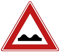 Verkeersbord J1: Slecht wegdek
